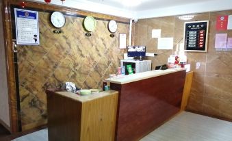 Wuchuan Xuanyi Business Hotel