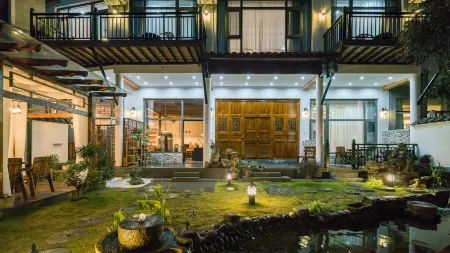 Liusu Inn Отели рядом с достопримечательностью «Yixing Wanfo Temple»