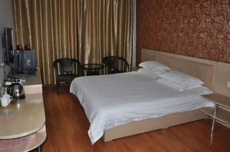 Xinbo Business Hotel Отели рядом со станцией Junanbei Railway Station