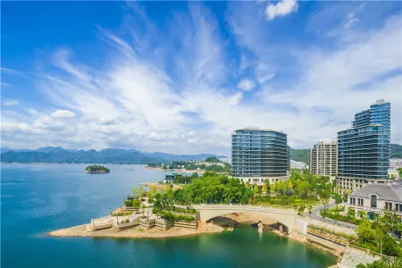 Lvcheng Lanwan Holiday Hotel Отели в г. Чуньань