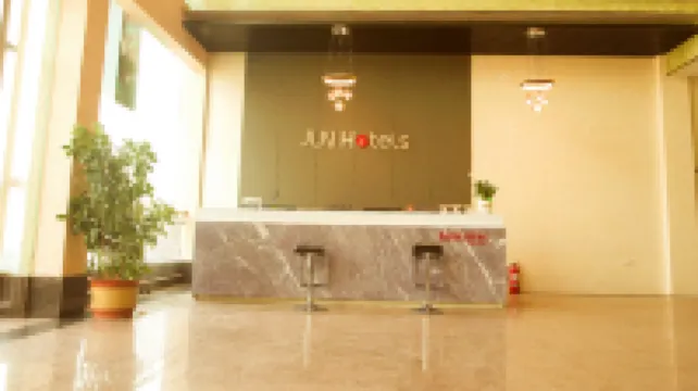 Junyi Chain Hotel (Fei County Shangye Zijing Plaza)