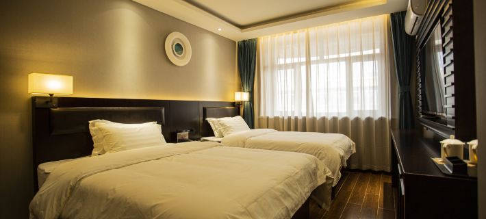Fujinyi Business Hotel Hotel di Fujin