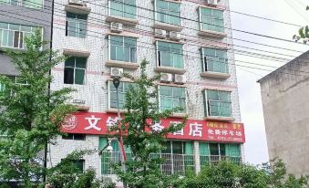 Baojing Wenfeng Business Hotel
