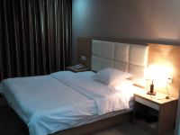 新县巴厘岛商务宾馆 - 大床房