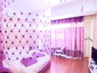 旭鸿酒店式公寓(大连万达广场店) - 紫色浪漫圆床房