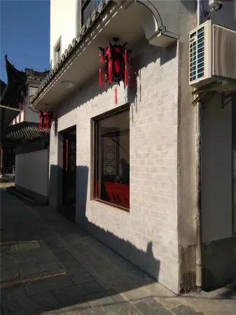 Jixi Guyuelou Hotel Отели в г. Цзиси