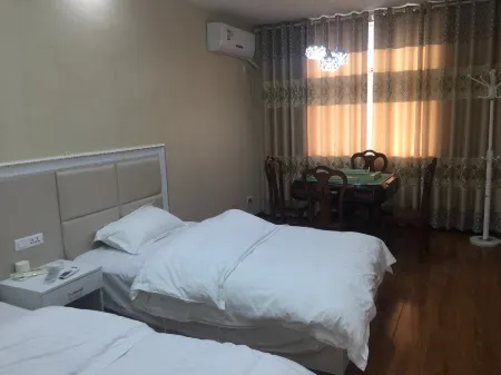 Nanzhang Xinshi Hotel Отели рядом со станцией Nanzhang Railway Station