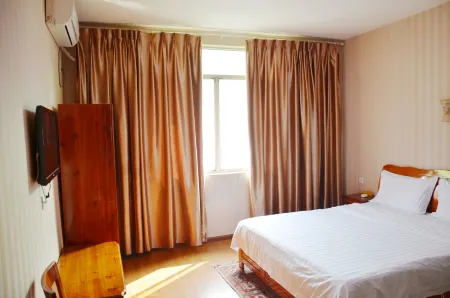 Pengzhou Youranju Accommodation Отели в г. Пенчжоу