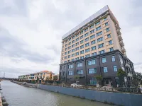 Vienna International Hotel (Shanghai Dishui Lake Lingang  Wanda ) Hotel in zona Shanghai Agriculture College Training Base
