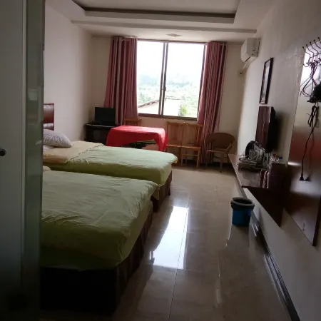 Huang Ping Yan Fei Business Hotel