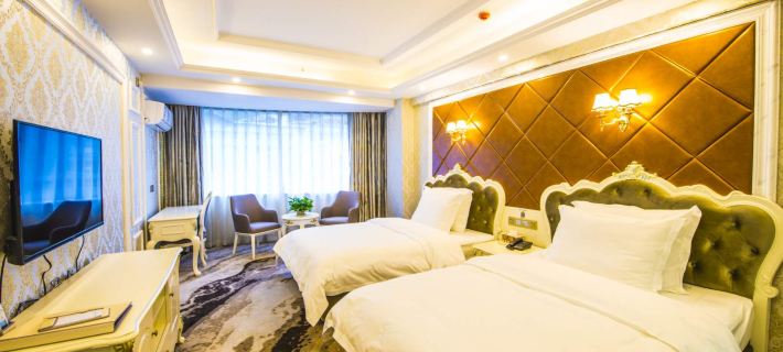 Jianxing Hotel Hotele w: Powiat Jiulong