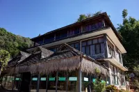 Fuxingji Pu'er Tea Guesthouse - بار