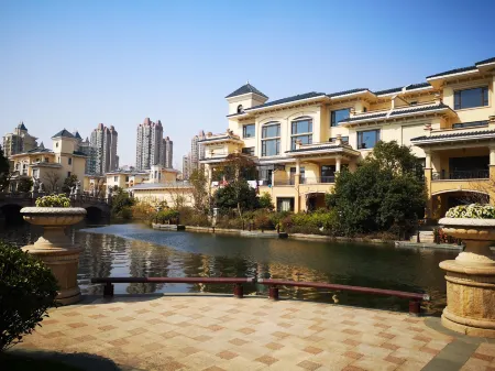 Qidong No.7 Western Style House Hotel Отели рядом с достопримечательностью «Yuantuojiao Scenic Resort»