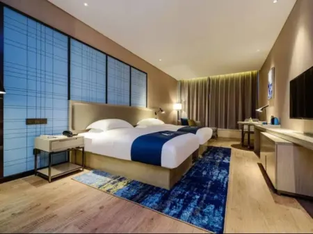 Echarm Hotel (Guiyang Airport Outlets) Отели рядом с достопримечательностью «Guizhou Police College»