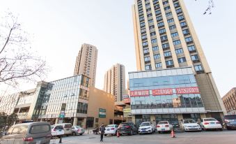 Qingdao Yipinxi Qingshe Apartment (Sifang Long-distance Bus Station Beiling Subway Station Shop)