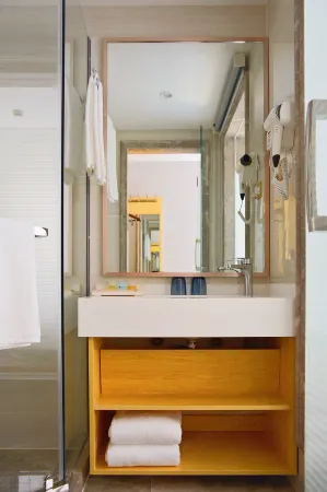 Wan W Xin Hotel (Shanghai Wujiaochang Sports University) Отели рядом с достопримечательностью «Shanghai Open University Yangpu Branch School»