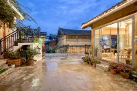 Lijiang Yixing Huaxi Inn - إقامة ريفية