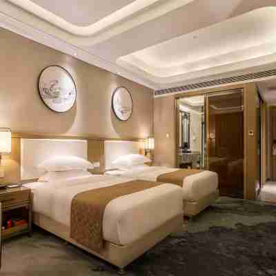 Shiyan Meisheng Holiday Hotel (Shanghai Road University Town) Rooms