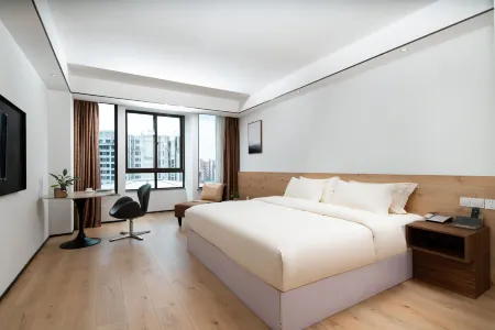 Bo Man Hotel Отели рядом с достопримечательностью «Shiji Square»