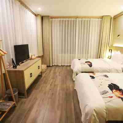 稻城風馬謠精品酒店 Rooms