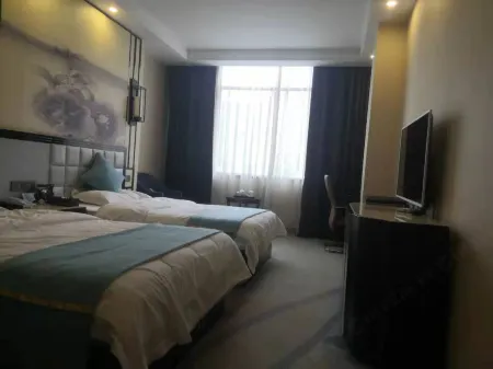 Rongfeng Fine Goods Hotel Отели рядом с достопримечательностью «Глобальный автомобильный пассажирский станция Ляо Ляо»