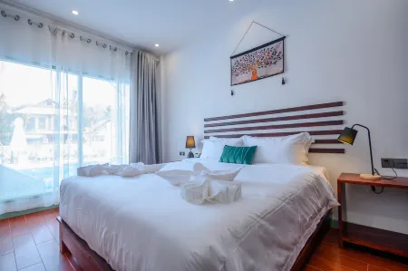 Amanda Hotel Отели рядом с достопримечательностью «Wat Xieng Muan»