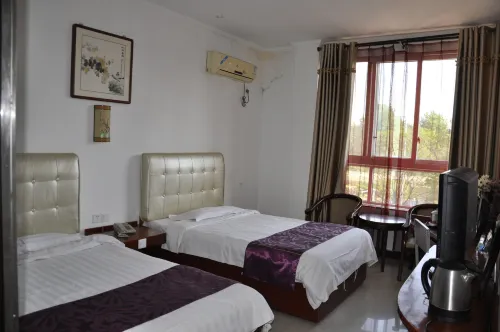 Tanbai Xinyuan Express Hotel