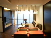 半岛蓝湾公寓(青岛胶南灵山湾度假区店) - 全海景双卧商务套房