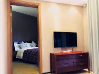 Yumi Holiday Apartment (Changjiang Qizi Bay) Hotels near Qixing Yanwoling