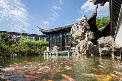 Zhenze Waterside Houses Отели рядом с достопримечательностью «Парк водно-болотных угодий класса Цзянсу»