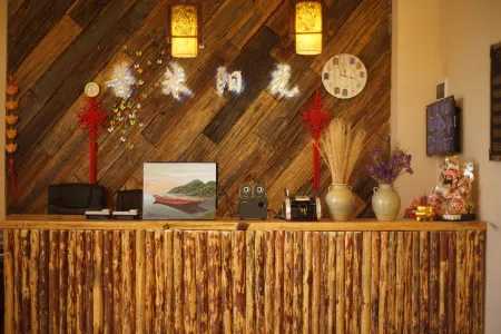 Lugu Lake Pumi Sunshine Hotel Отели рядом с достопримечательностью «Langfang»