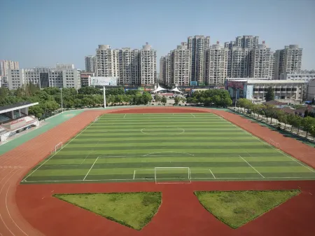 Honggu Hotel Отели в г. Ханьчуань