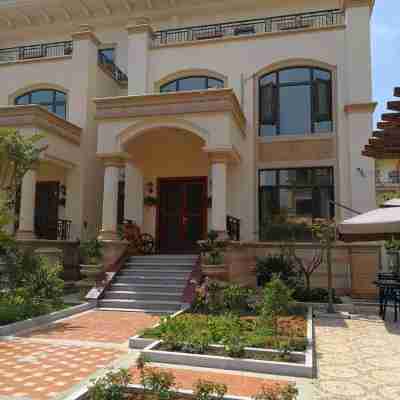 啟東聆海庭院別墅 Hotel Exterior