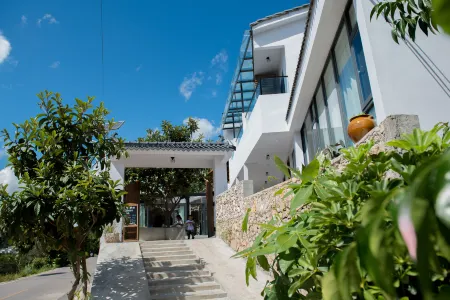 Yizhao Yixi Inn Отели рядом с достопримечательностью «Pingdong Square»