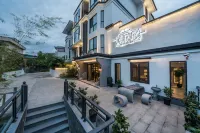 jiuquxinyuebieshu Hotels near Xiamei Ancient Residence