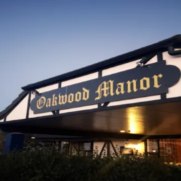 Oakwood Manor Motor Lodge Отели рядом с достопримечательностью «Мангер»
