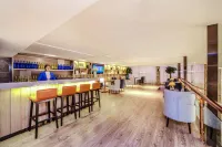 Echarm Hotel (Xingyi DCF Jushan Square)