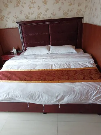 Wenchuan Xinyuan Inn Отели рядом с достопримечательностью «Baihua Bridge Relic Site»