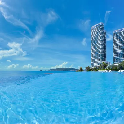 Twin Moon Bay Xianghai Hot Spring Holiday Hotel Hotels near Turtle National Reserve Areas