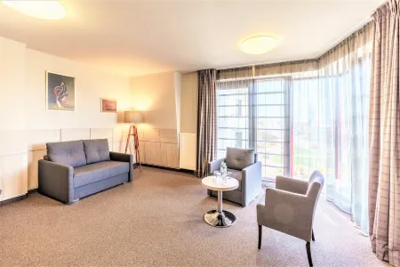 Wellton Riga Hotel & Spa Отели рядом с достопримечательностью «Brīvības Piemineklis»