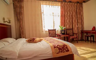 Derong Golden Sun Hotel Hotels near Wakka Love Dance Flower Sea Scenic Area