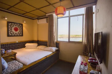 Northwest Folklore Inn (Zhangye National Wetland Park Branch) Отели рядом с достопримечательностью «Xilaisi»