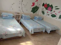 Huinan Shugang Fashion Hotel