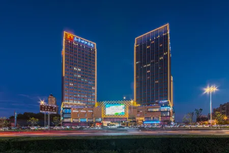Rezen Dong Hotel (Changchun International Convention and Exhibition Center) Отели рядом с достопримечательностью «Changchun Wuhuan Gymnasium»