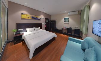 Xingyi Chain Hotel Jiangxia Metro Station