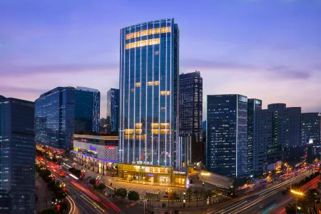 Guomao Hotel Отели рядом с достопримечательностью «Taoxi Temple»