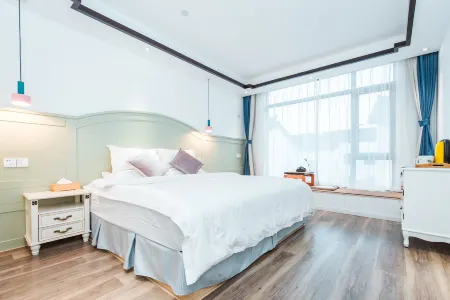 Lanhu Xiaozhu Hostel Отели рядом с достопримечательностью «Ботанический сад Цзяньнан»