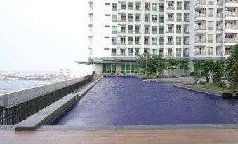 Ocean View 2Br Apartment at Green Bay Condominium Pluit by Travelio