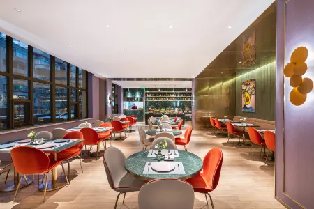 Manxin HotelGogoli StreetHarbin Railway Station Отели рядом с достопримечательностью «Heilongjiang University of Chinese Medicine Asset Management Department»