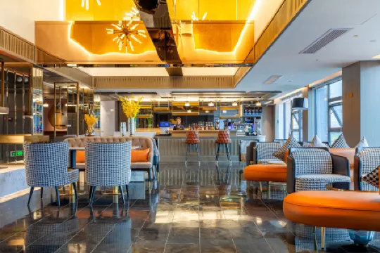 Kasion Pusham Hotel Отели рядом с достопримечательностью «Yiwu Guoji Bolan Center»